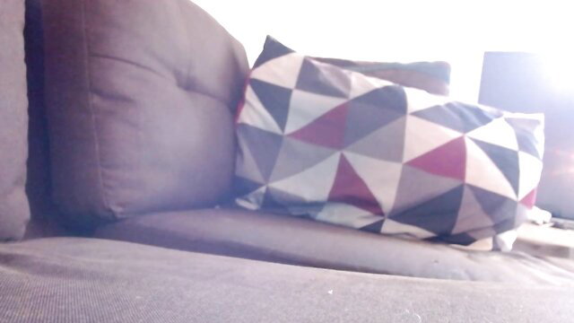 Adult content with geometric patterned pillow