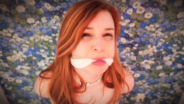 Redhead Olive Wood gagged and bound damsel in distress