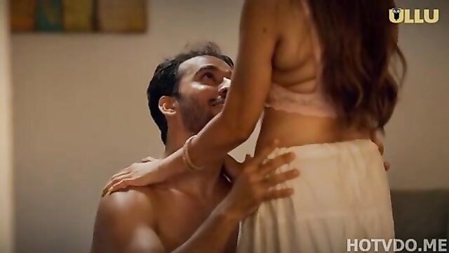 Indian couple hot embrace, shirtless hunk grabs busty woman's ass in Ullu series