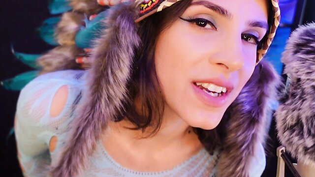 Irma La Dulce in sexy headdress smiles for JOI tease