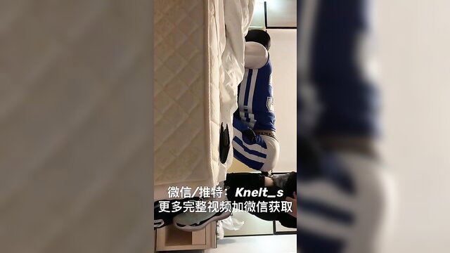 Kneeling Asian sub in blue striped lingerie teased by dom in fetish play