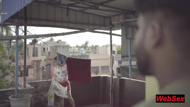 Indian woman in wet saree and red panties on balcony spied by man