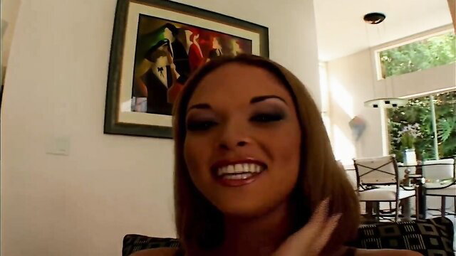 Smiling mixed-race MILF with smoky eyes and glossy lips in adult video