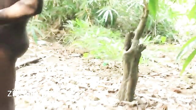 Nude black woman with huge ass squats over tree in jungle amateur outdoor