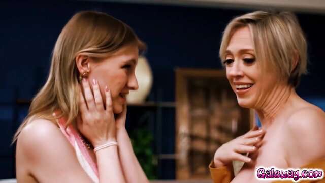 Two blonde Girlsway babes in sensual topless lesbian tease