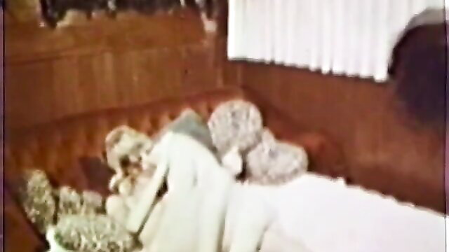 Retro XXX thumbnail: busty blonde on couch in vintage room