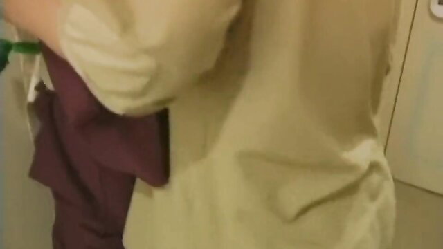 Japanese MILF in beige blouse and purple skirt toying pussy