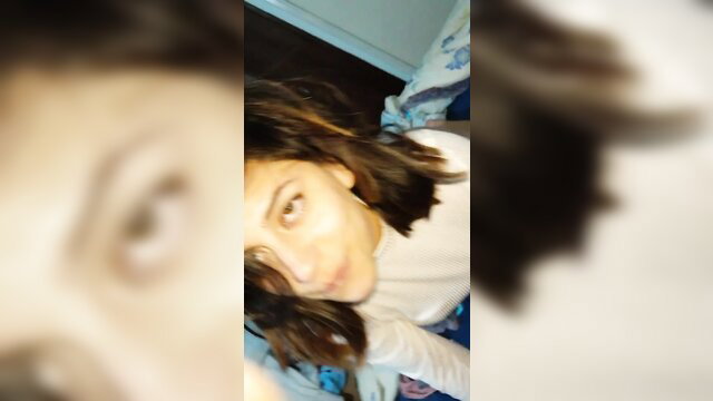 Blurry close-up of young Latina ex-gf in bed, amateur hookup tease