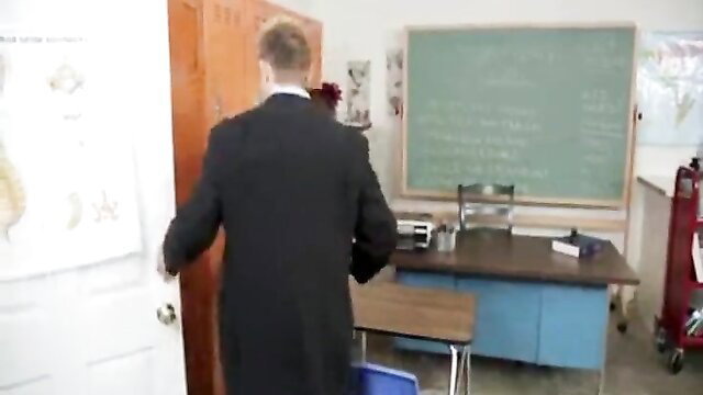 School teen busted by suited teacher in classroom scene