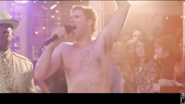 Shirtless man with chest hair sings naked on TV stage with crowd
