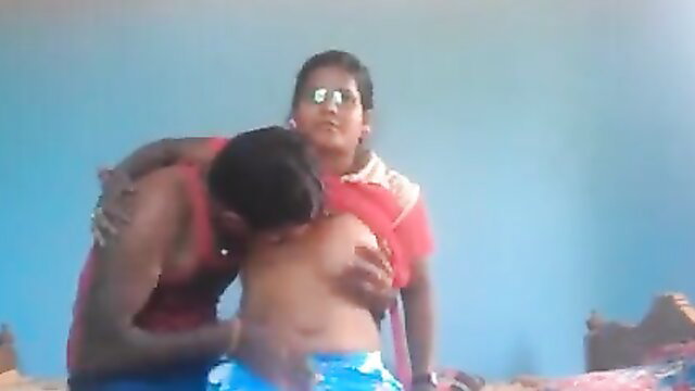 Indian teen lovers in hot embrace, man sucking woman's big tits