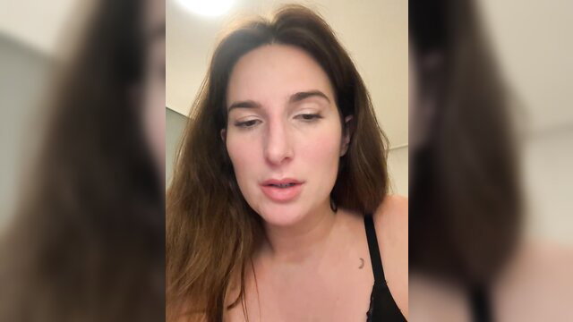 Thescorpionfr French model closeup in black lingerie, seductive lips