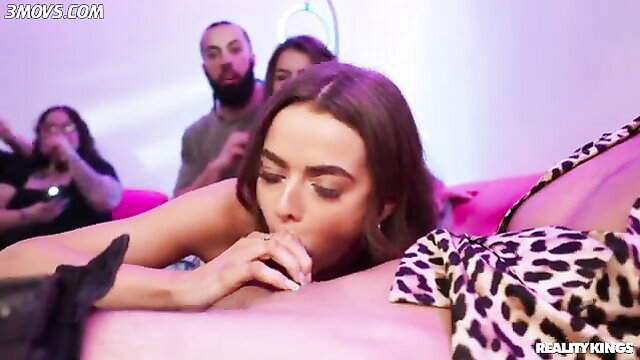 Beautiful brunette happily sucks dick in front of girlfriends