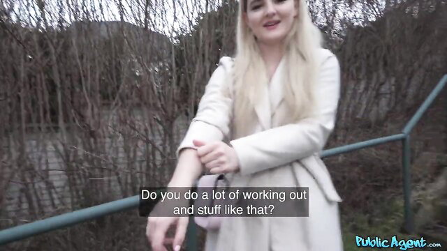 Blonde Eliza Eves in coat asks about workouts on Public Agent