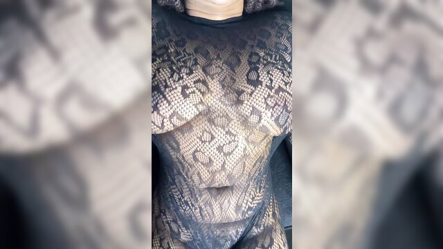 Black hottie in sheer snake print lingerie showing massive titties