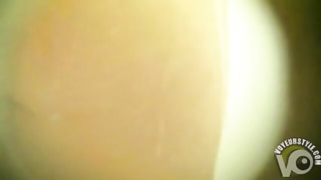 Hidden cam closeup of exposed shaved pussy