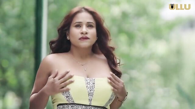 Perverted Indian cougar in yellow tube top squeezing big tits outdoors