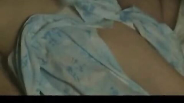 Japanese woman in blue lingerie with huge tits side view