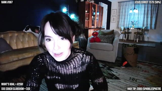 Asian beauty in sheer black lace top dances seductively