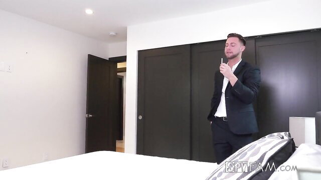 Handsome suited guy in luxury bedroom, blackmail stepsis New Years spy fam