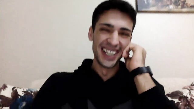 Hot Arab guy smiling on phone, masturbating big cock in tight gay amateur vid