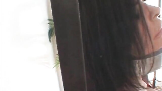 Busty Asian slave in bondage collar, nipple clips tease