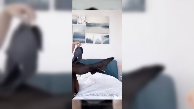 Busty Bella solo fun in stockings on bed, big tits tease