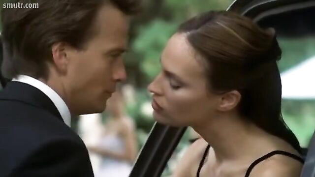 Jolene Blalock topless kissing man in car bed scene