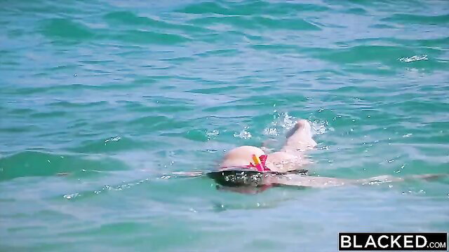 Stacy Cruz swims nude in turquoise water, pale ass up, Blacked.com