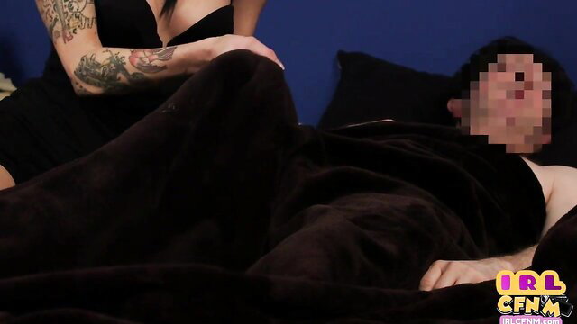 Tattooed CFNM babe in black dress deepthroating lucky guy on bed