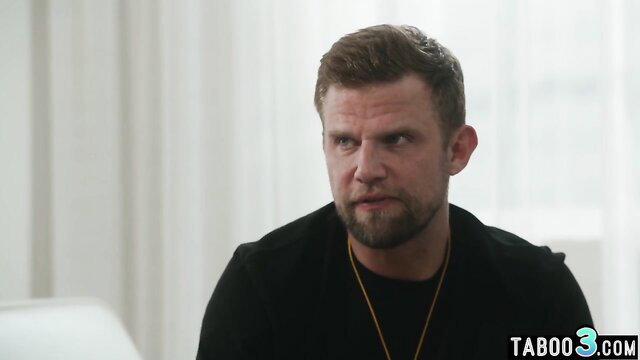 Handsome bearded man in black sweater smirks in taboo video thumbnail