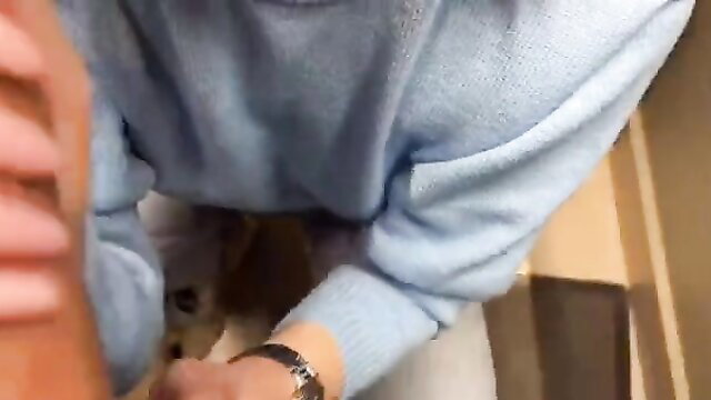 Woman in blue sweater packs stepsister's pussy in public restroom