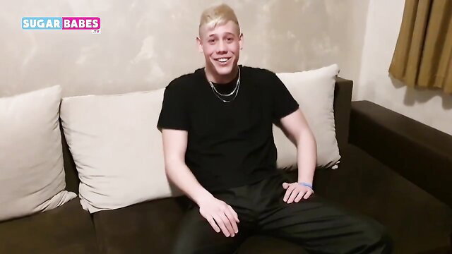 Blond twink smiling on couch in Sugarbabes midget porno thumbnail
