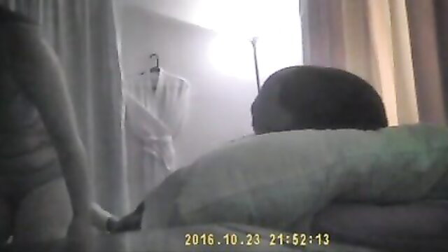 Hidden cam Asian masseuse handjobs client on table