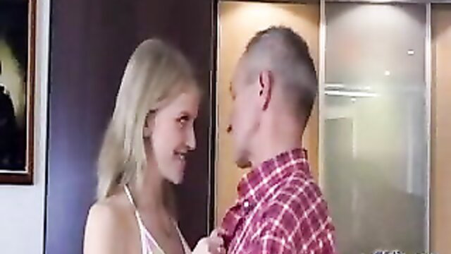 Skinny blonde piano teacher in tank top flirts with man in shirt