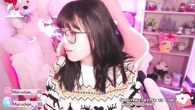 Maru Chan cute Asian gamer girl in Christmas sweater glasses bangs