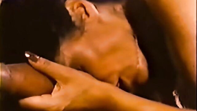 Kay Parker grabs Honey Wilder's face in 80s taboo lesbian foreplay