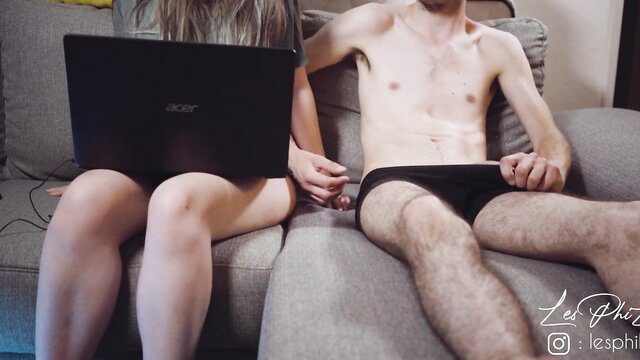 French student amateur couple on couch, girl teases guy's bulge