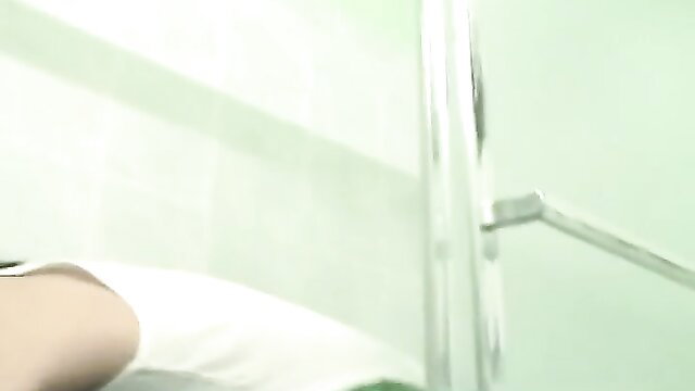 Busty Asian babe pours soda over wet tits in steamy shower