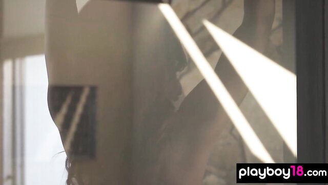 Steamy ebony 18yo reveals black snatch in sunlit room