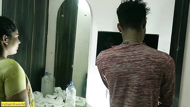 Indian mommy in yellow saree with guy in bathroom mirror reflection