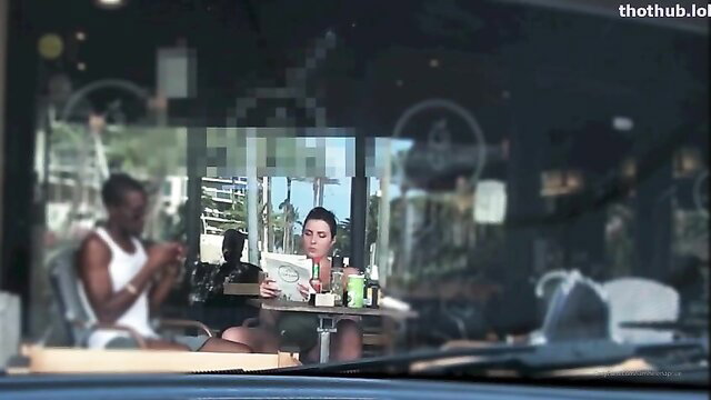 Helena Price braless at cafe table, hot candid upskirt view