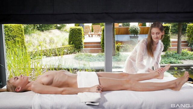 Nancy Ace massages Tiffany Tatum nude in outdoor spa scene