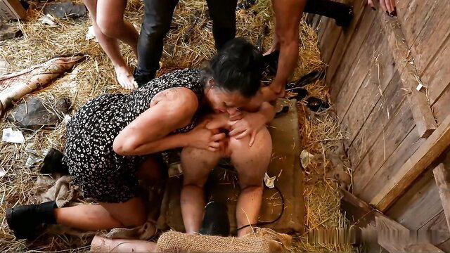 Asian MILF in floral dress gangbanged in barn, taking rough ride