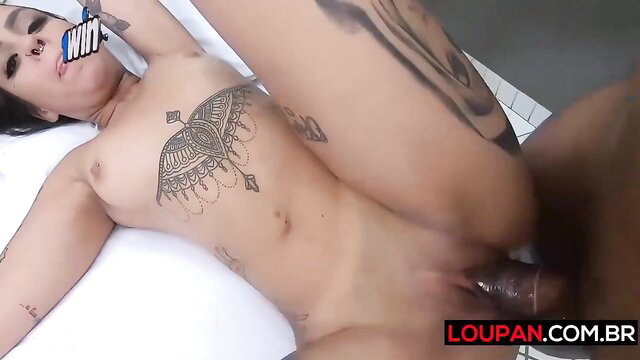 Tattooed darkhaired babe fucked missionary by black guy