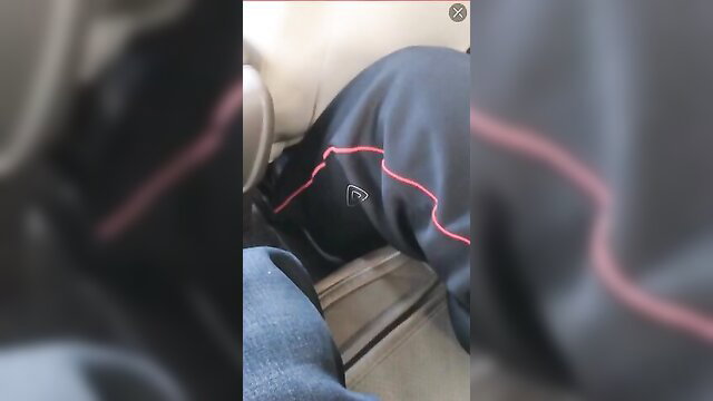 Older Chinese stud's bulge in red-trimmed track pants, seated crotch view