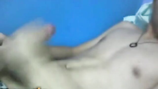 Middle Eastern twink stroking his cock and cumming solo