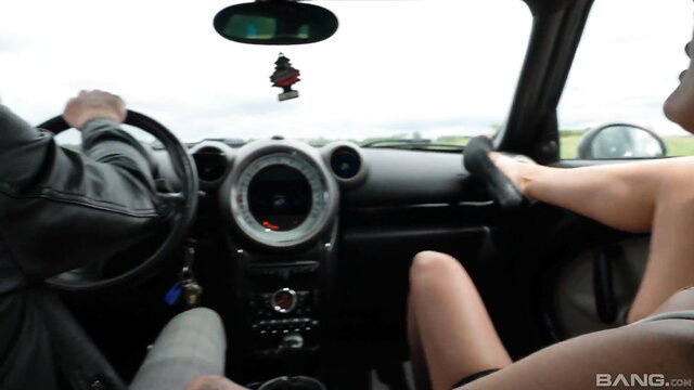 Nerdy beauty rides young dick hard in car, legs spread wide