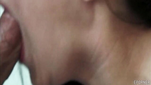 Closeup of Asian woman eagerly sucking thick cock in raunchy XXX clip