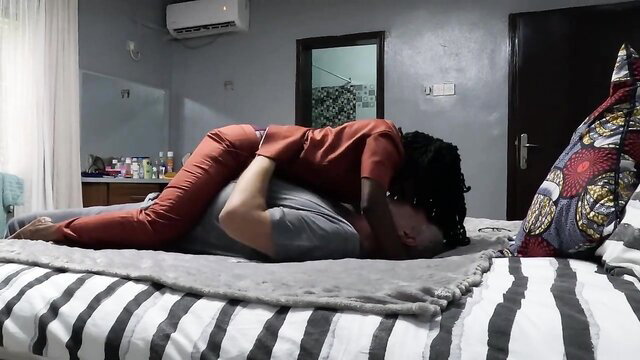 Elderly white man spoons young black woman in hot bed sex embrace